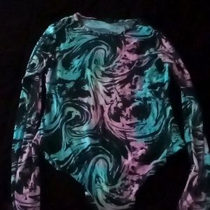 Size XL, sheer long sleeve bodysuit. Snaps at bottom.